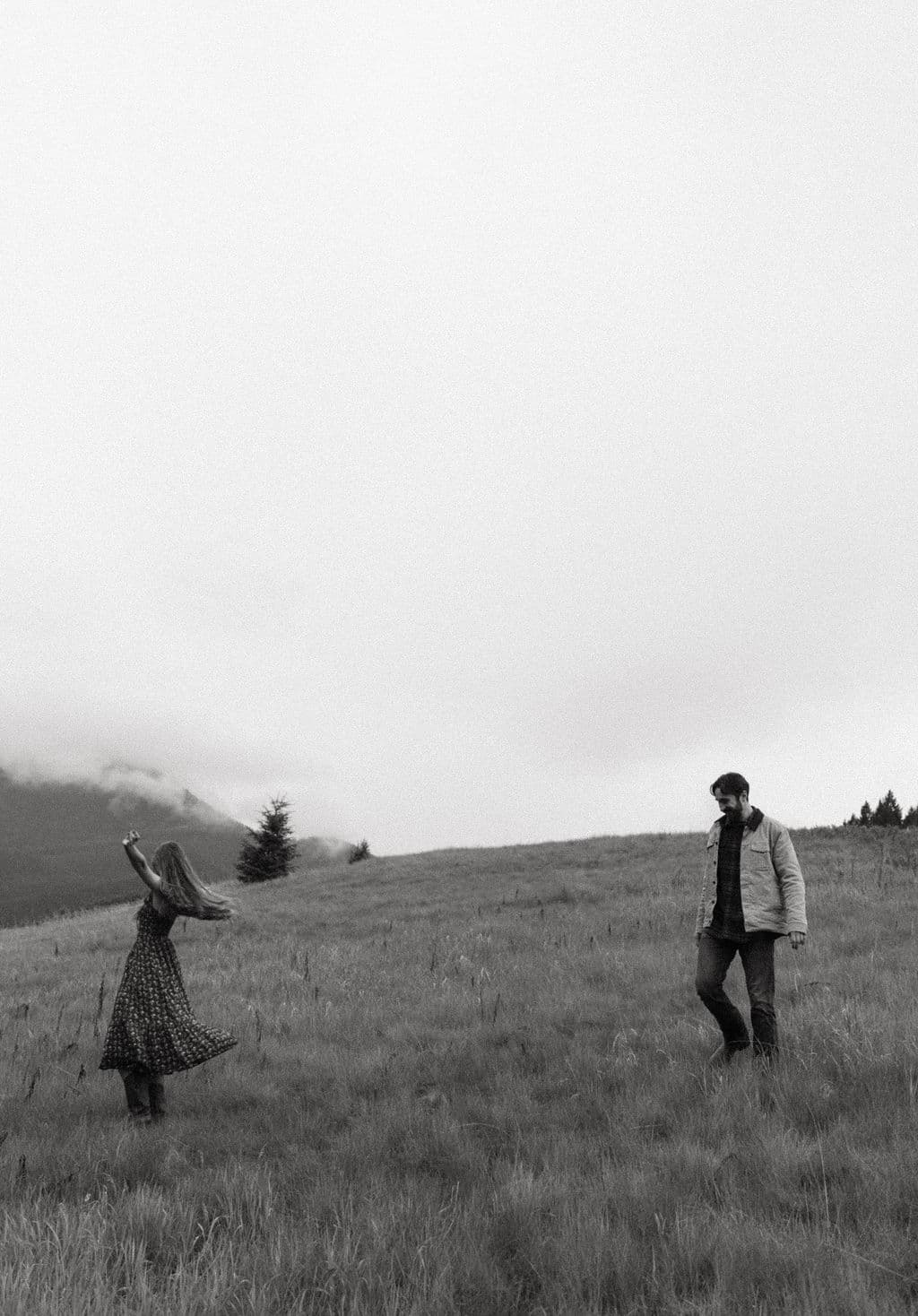 Aaron and Alison in a misty Montana meadow